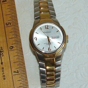 Armitron Mens Quartz WATCH,Gold/Silver Tone, Day/Date, Water Resis Need Batt C31